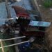 Mujer herida al caer una motocicleta en un puente